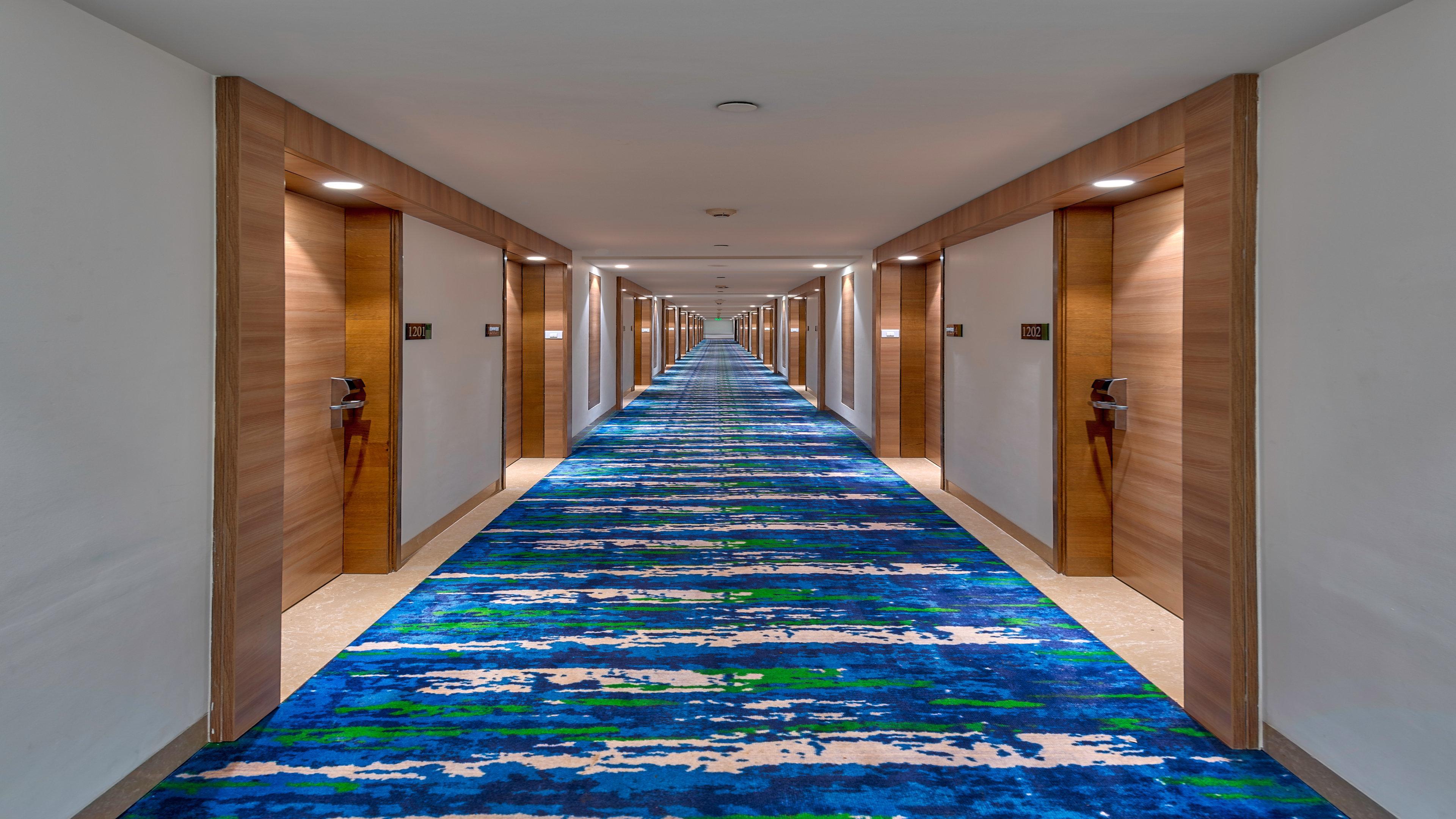古尔冈90区假日酒店 外观 照片 Carpet in a hotel