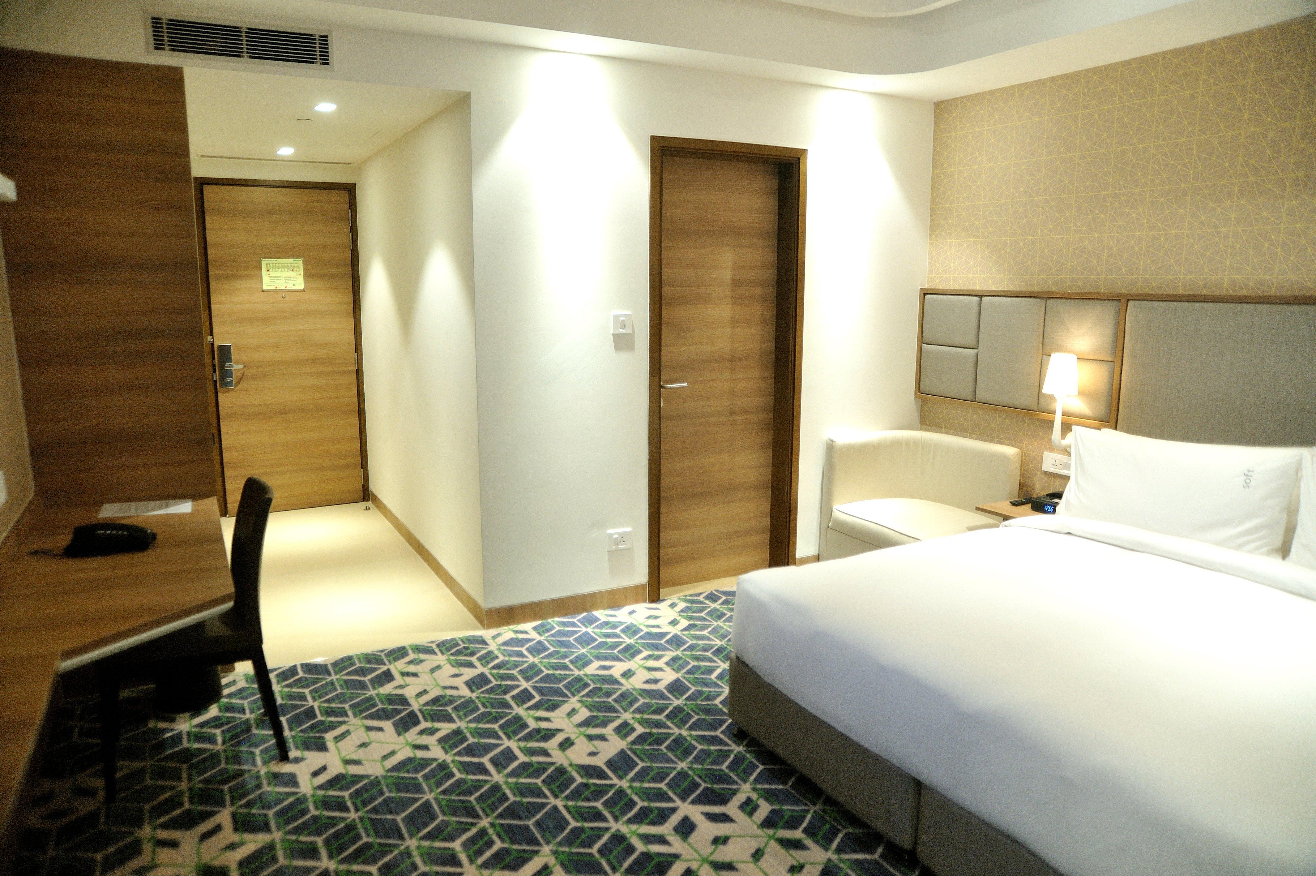 古尔冈90区假日酒店 外观 照片 A room at the hotel